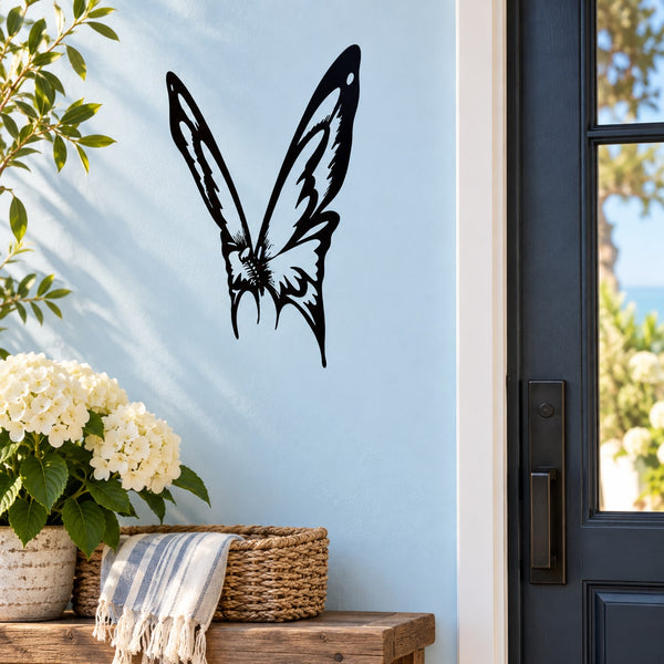 Black butterfly wall vinyl decal on light wall near window
