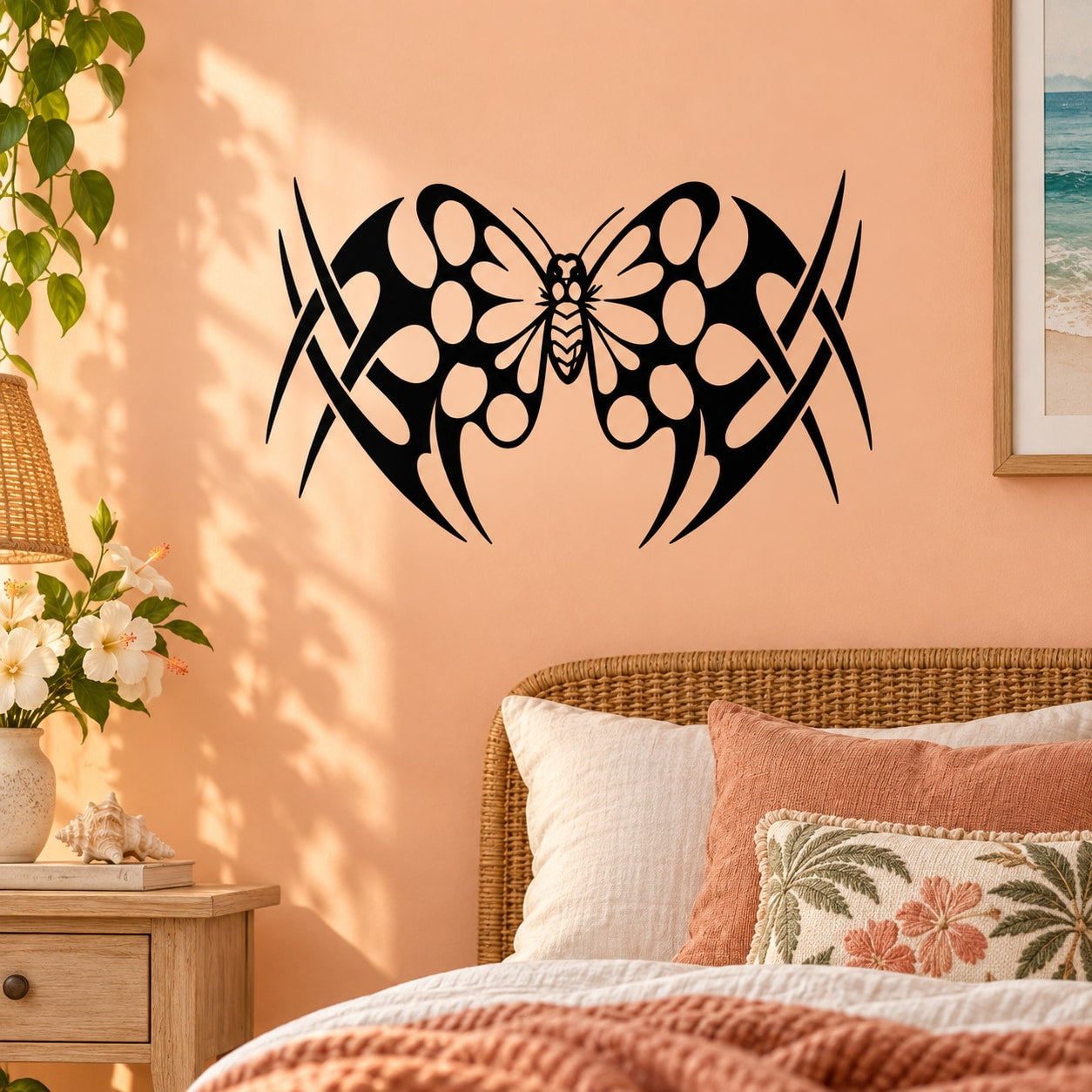 Butterfly vinyl wall decal in black with stylized wing shape and side accents