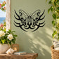 Black butterfly vinyl wall decal with ornate tribal wings and swirls