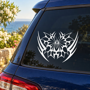 Butterfly vinyl decal with white wing-style pattern on car window