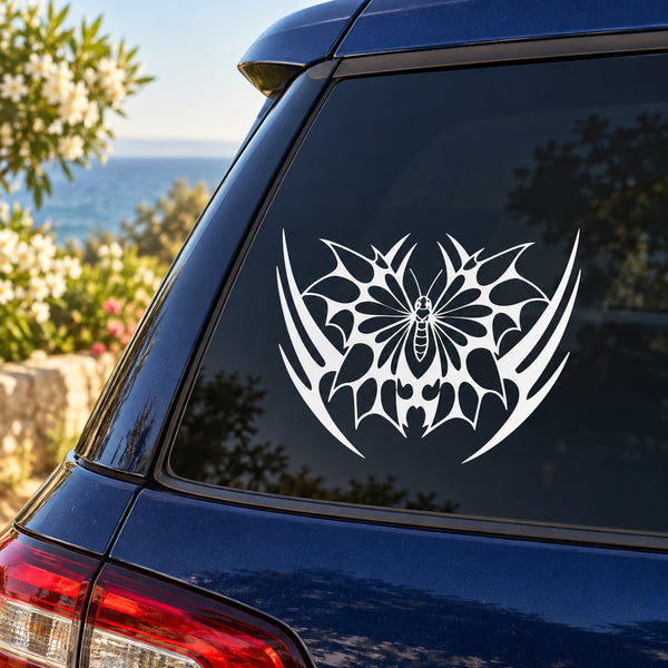 Butterfly vinyl decal with white wing-style pattern on car window