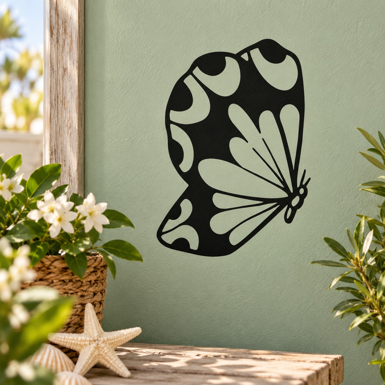 Black butterfly vinyl wall decal with detailed wing pattern