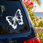 White butterfly vinyl car decal on the rear window of a dark car