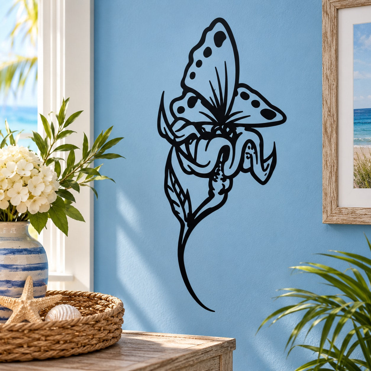 Black butterfly vinyl wall decal with detailed wings and antenna design