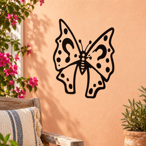 Black butterfly vinyl wall decal with dotted wings and bow center