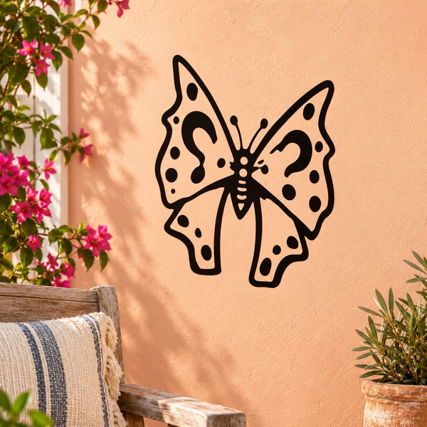 Black butterfly vinyl wall decal with dotted wings and bow center