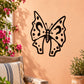Black butterfly vinyl wall decal with dotted wings and bow center