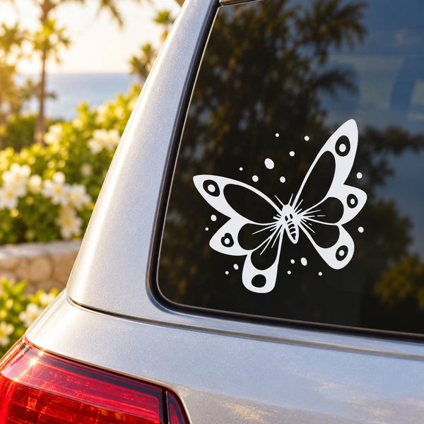 Black butterfly vinyl decal with white dots on car window