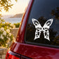 Butterfly vinyl car decal, white and black graphic on dark car window