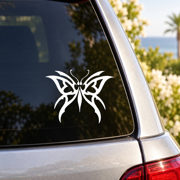 Butterfly vinyl car decal with white wing pattern on dark window