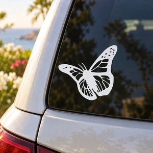 White butterfly vinyl decal on car window