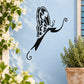 Butterfly vinyl wall decal with black wings and decorative swirl details