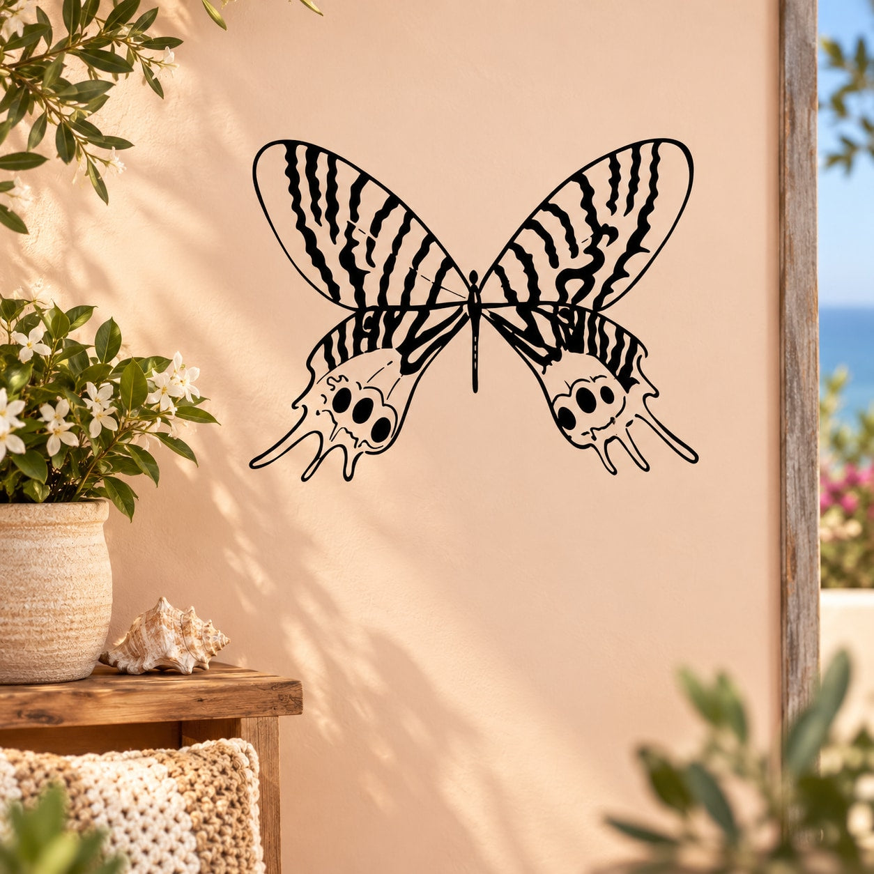 Black and white butterfly vinyl wall decal with striped wings and antenna details