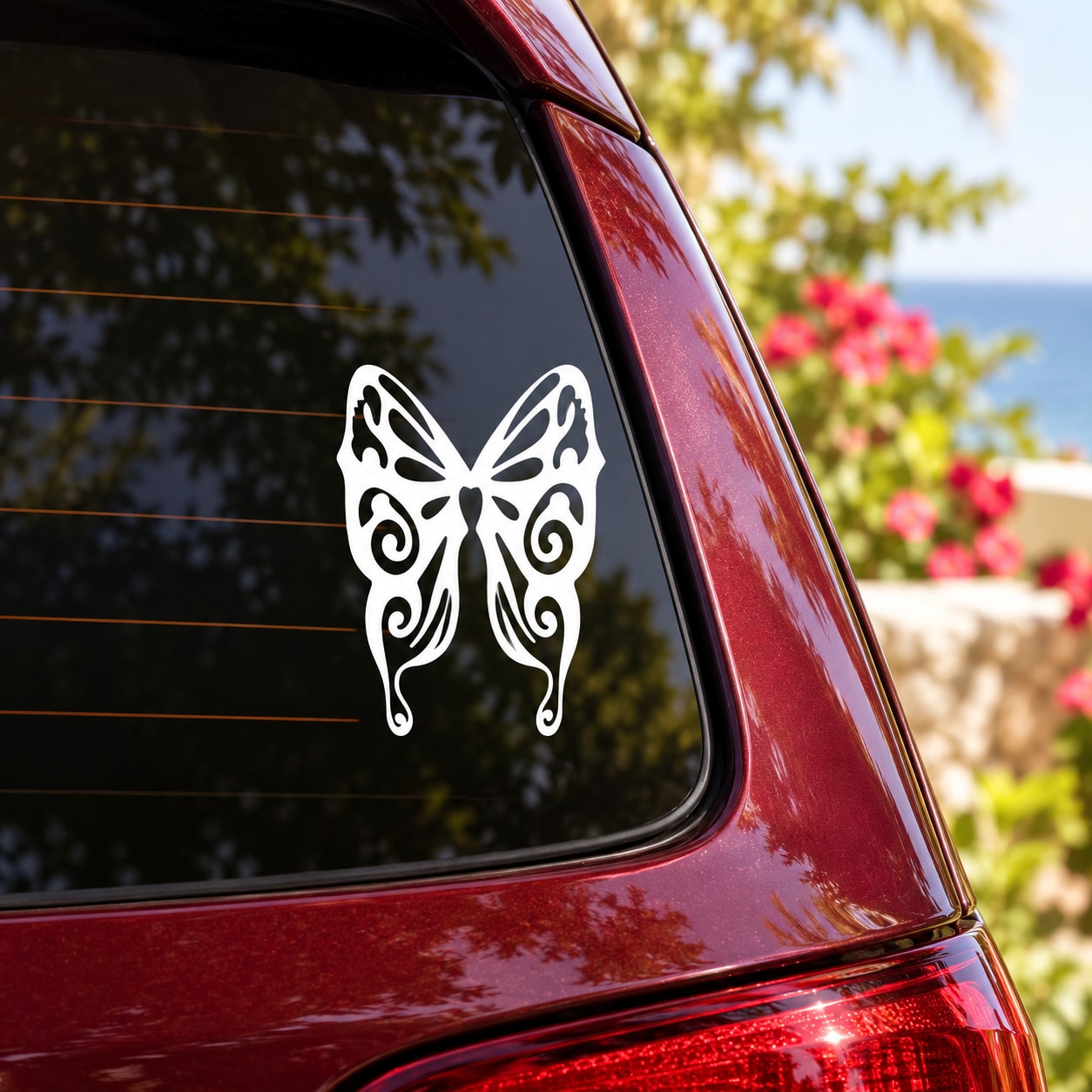 White butterfly vinyl decal on a car side window