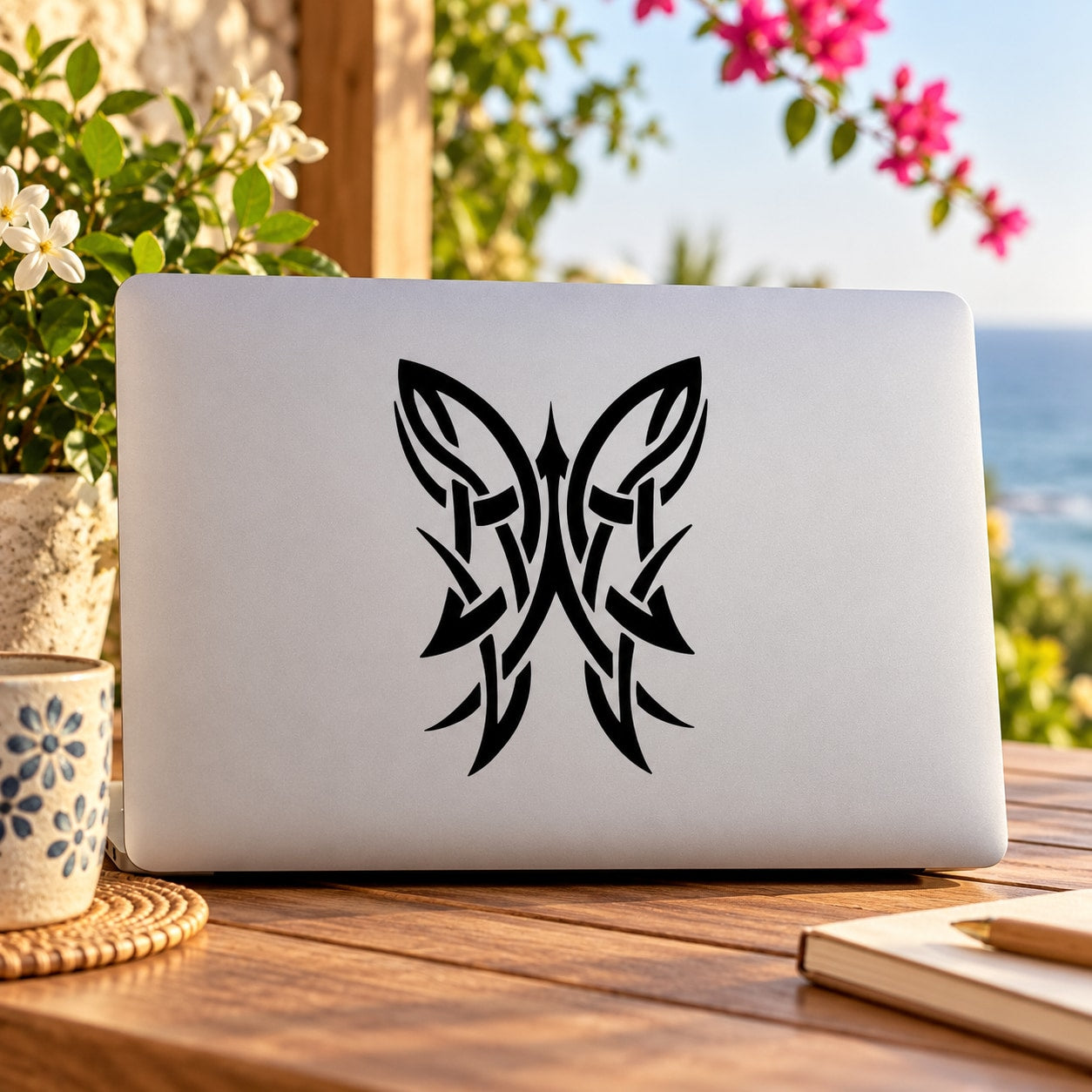Black tribal butterfly vinyl decal with symmetrical wing design