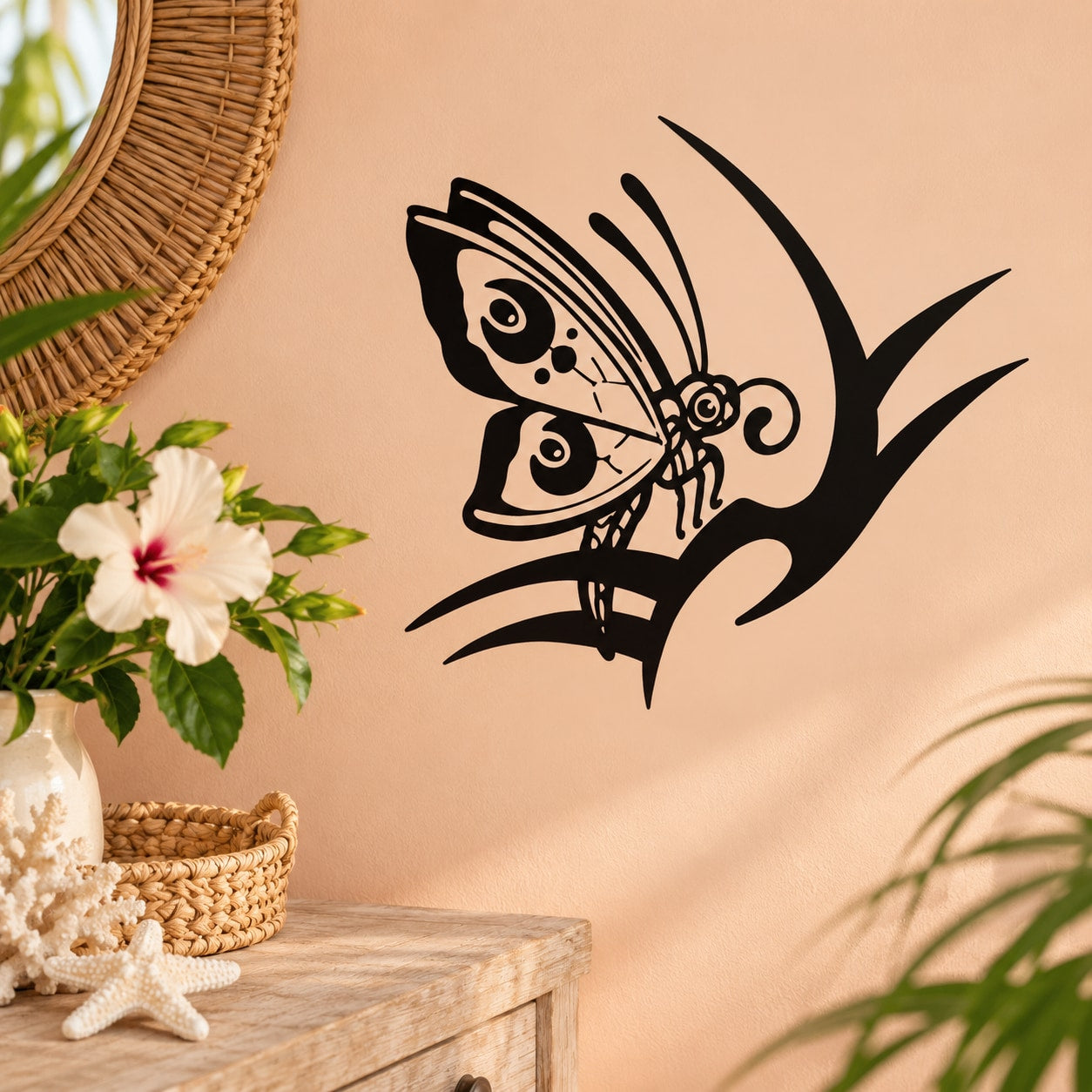 Black butterfly vinyl wall decal with stylized wings and antenna accents