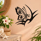 Black butterfly vinyl wall decal with stylized wings and antenna accents