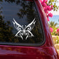 White butterfly vinyl decal with ornate wing design on car window