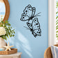 Butterfly wall decal with two dotted butterflies in black outline and light blue fill