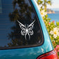 White butterfly vinyl decal on car window glass