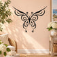 Black vinyl butterfly wall decal with ornate symmetrical wing design