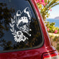 Butterfly vinyl car decal with flowers, white silhouette on a dark car window