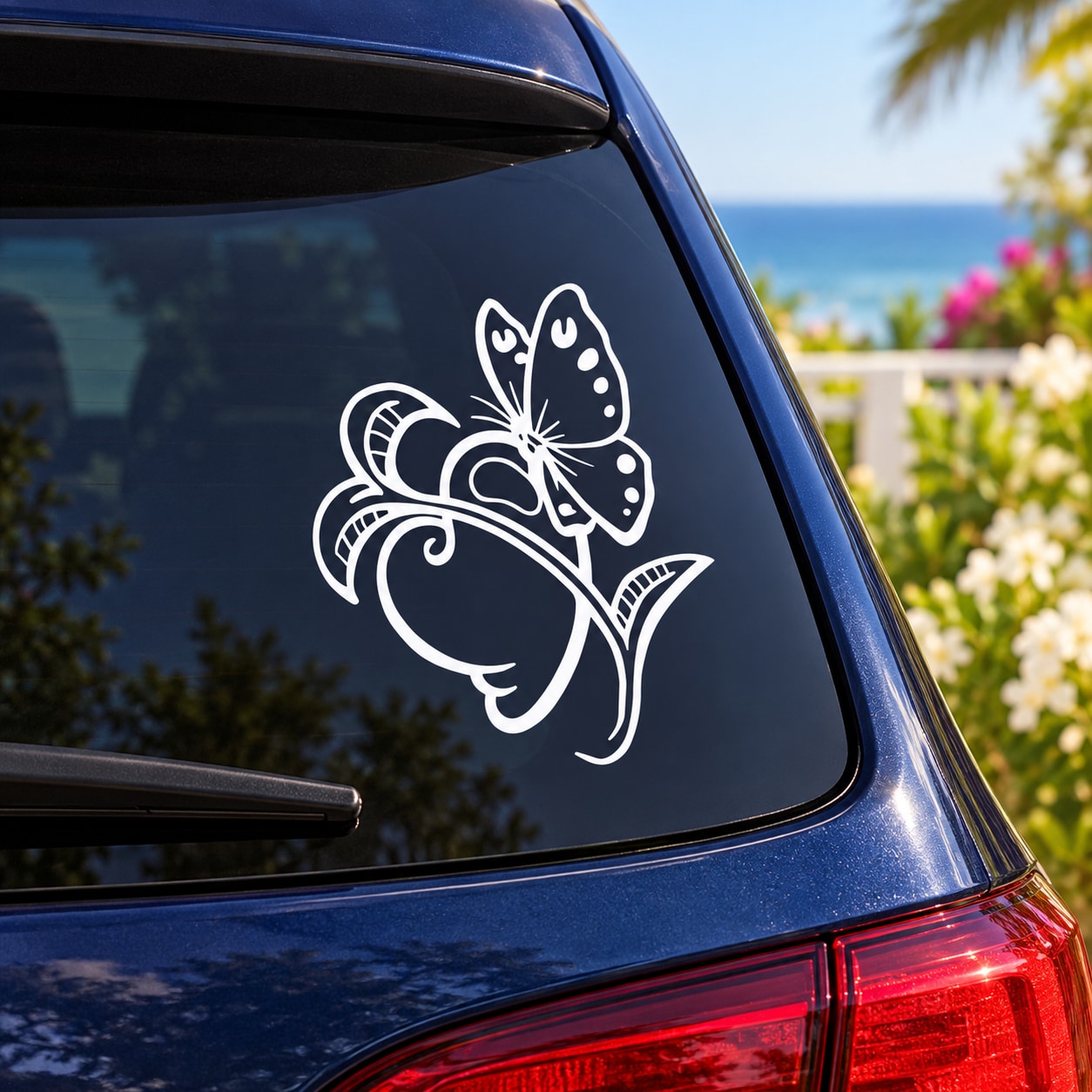 Butterfly and fish vinyl car window decal in white outline