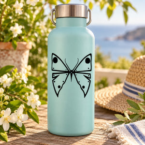 Butterfly vinyl decal with symmetrical bow design on light blue surface