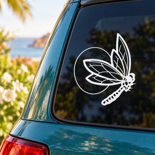 Butterfly vinyl decal with white outline on a car window