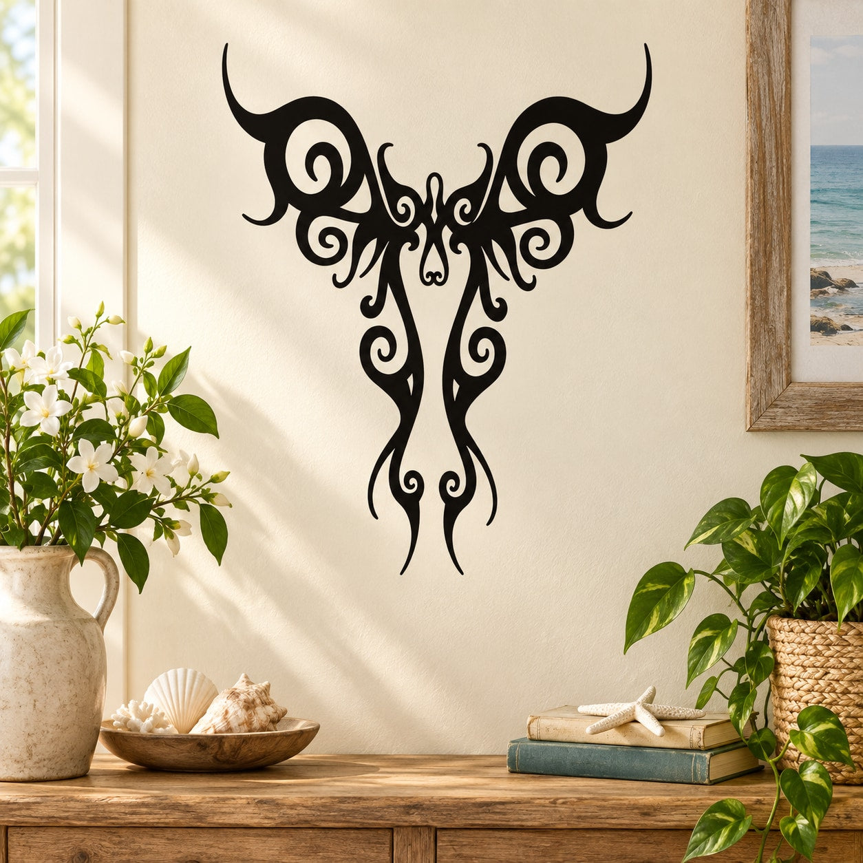 Black ornate butterfly vinyl wall decal with symmetrical wing filigree
