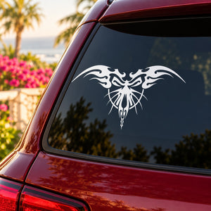 Butterfly vinyl car decal with ornate black wing design on window