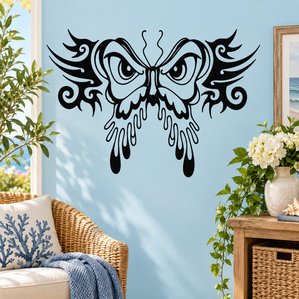 Black butterfly vinyl wall decal with ornate swirls and dripping wing details