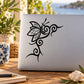 Butterfly vinyl wall decal: black ornamental butterfly with curls and antenna