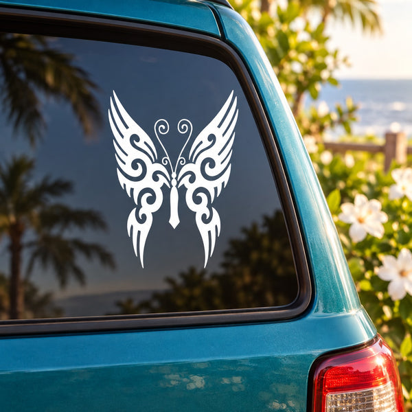 White butterfly vinyl decal on car window glass, symmetrical wing design