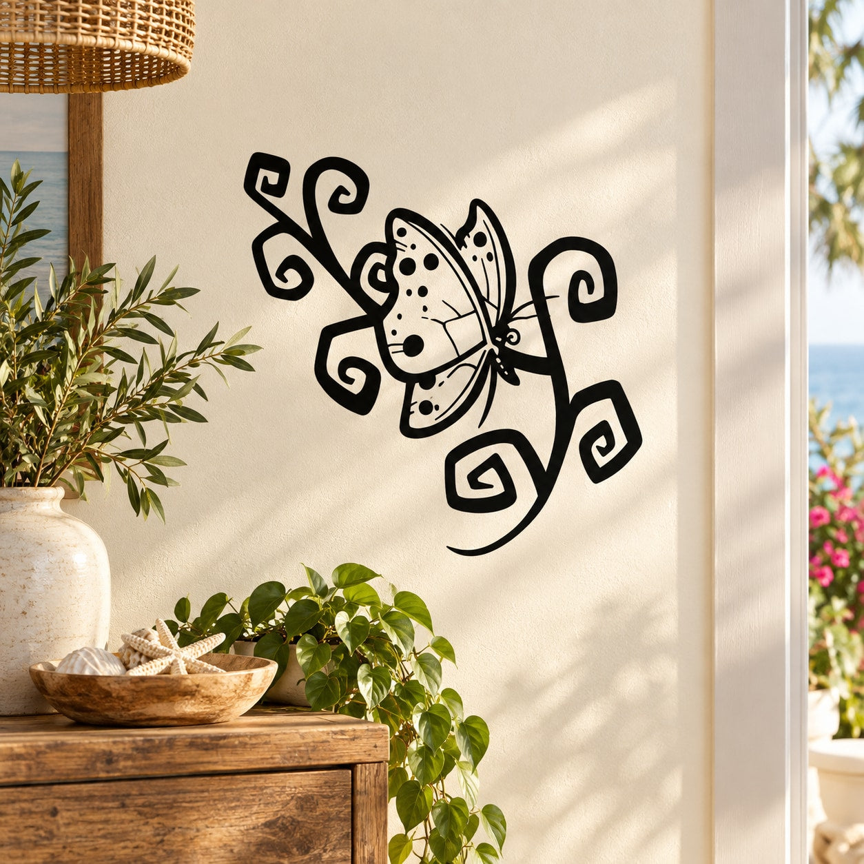 Black butterfly vinyl wall decal with ornamental swirl design