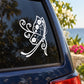 White butterfly vinyl decal on car window, swirled wings and antennae