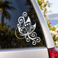 White butterfly vinyl decal with ornate swirls on dark car surface