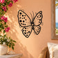 Butterfly vinyl wall decal with black dotted wings and curled antennae