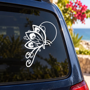 White butterfly vinyl car window decal with floral swirls and central ring