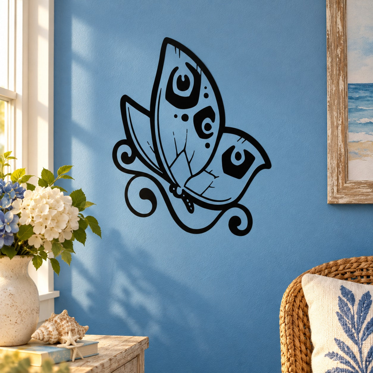 Butterfly wall decal with black line art and light blue accents