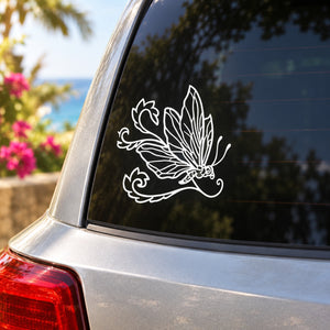 White butterfly vinyl decal on car window