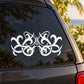White ornate butterfly vinyl decal with decorative swirls on a car window