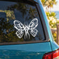 White butterfly vinyl decal on car window