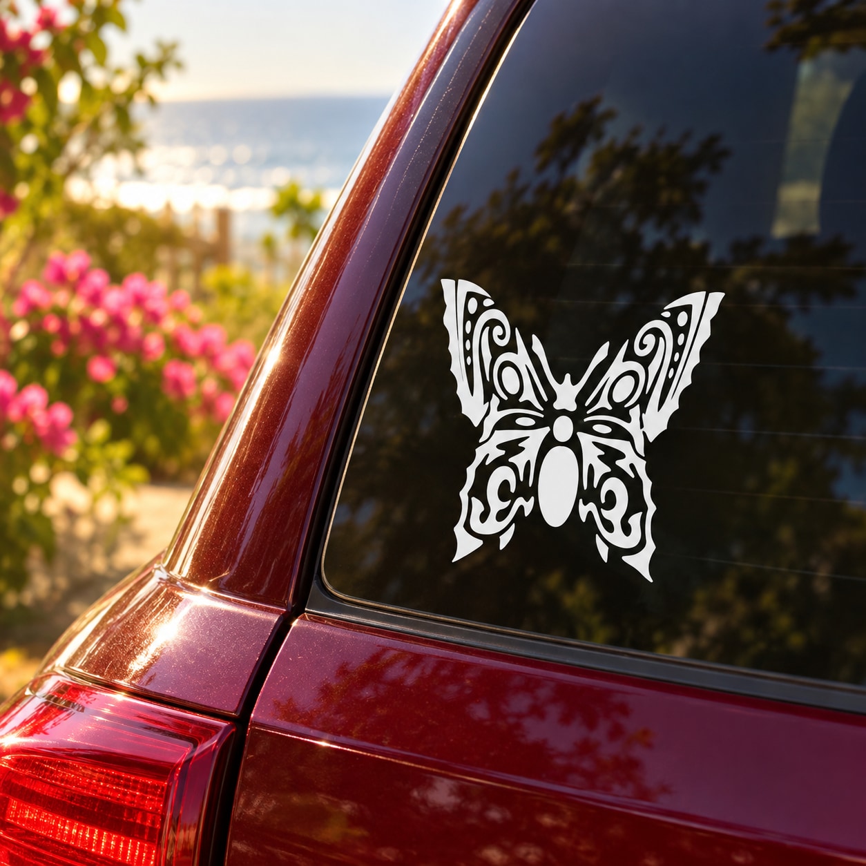 Butterfly vinyl decal sticker on a car rear window, black design