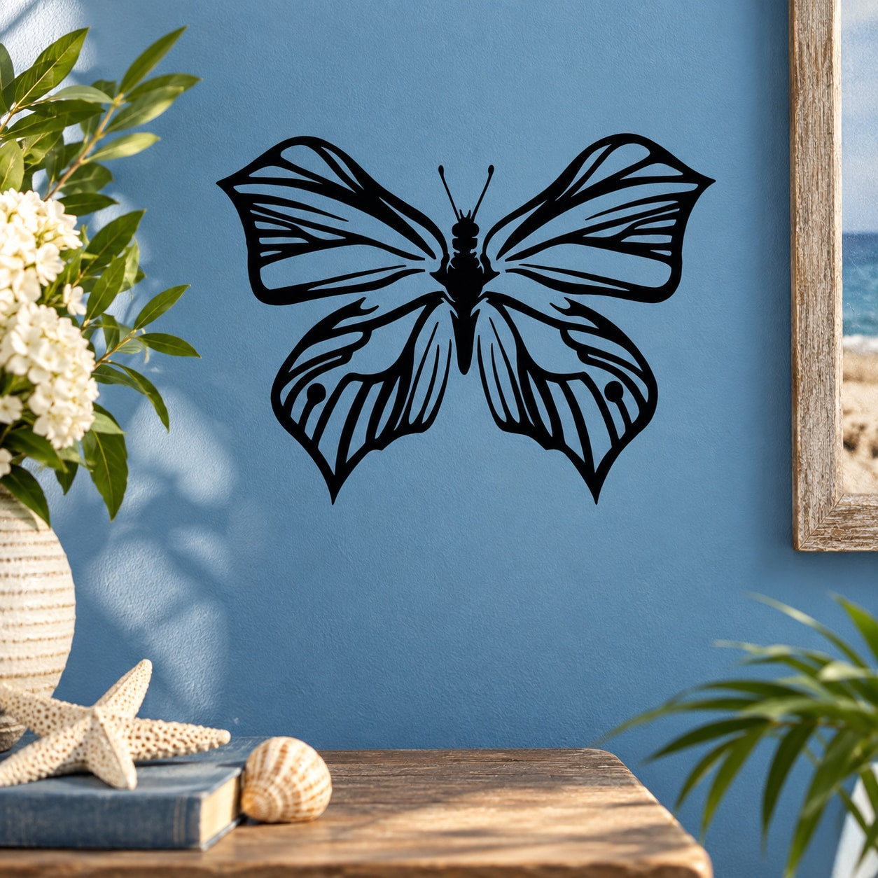 Black butterfly vinyl wall decal with wings spread