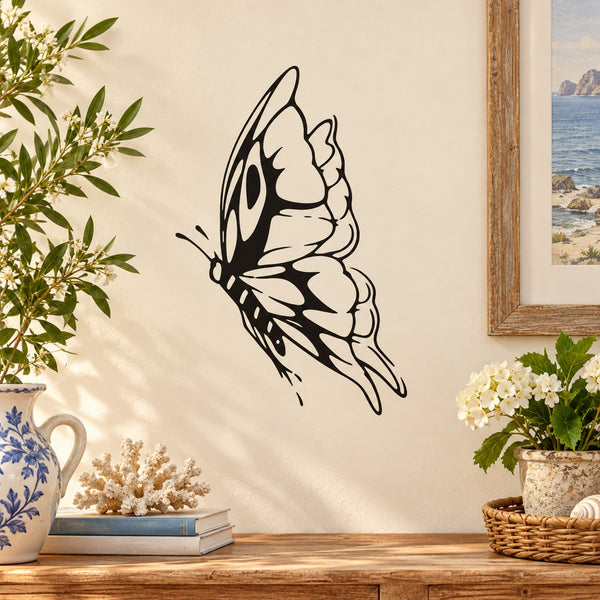 Black butterfly vinyl wall decal with wings spread and detailed body outline