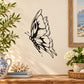 Black butterfly vinyl wall decal with wings spread and detailed body outline