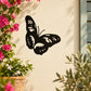 Black butterfly wall decal in vinyl-style silhouette