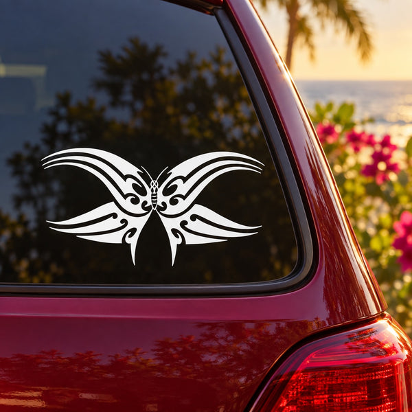 Butterfly vinyl decal with white wings on a car side window