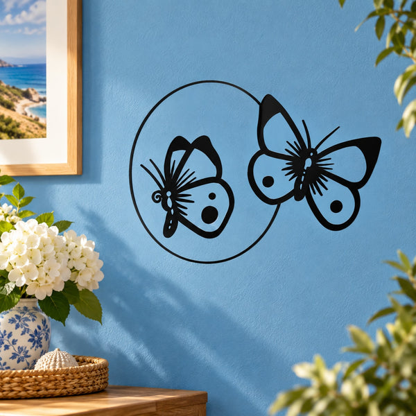 Butterfly vinyl wall decal with two black-and-blue butterflies inside a circle